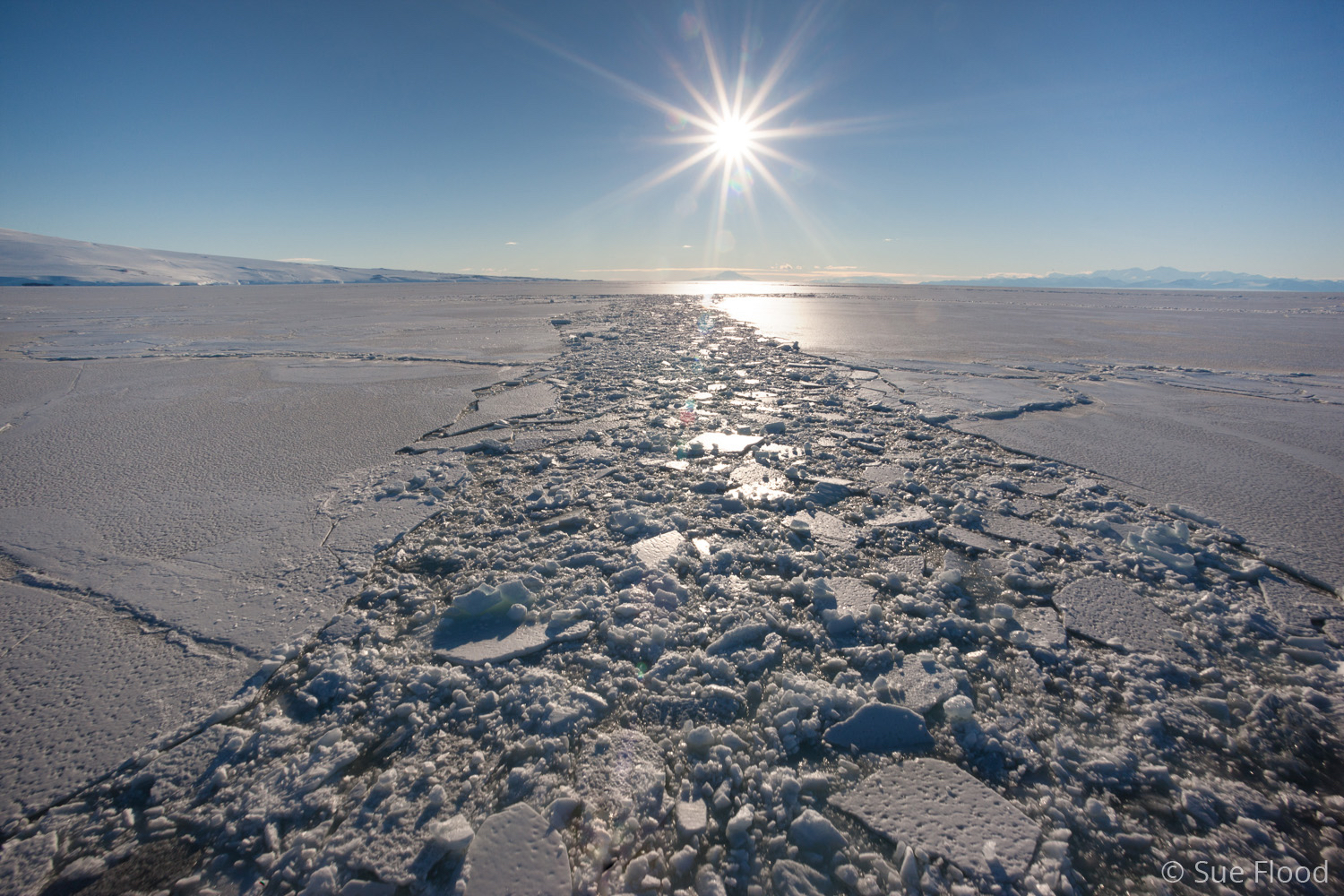 Broken sea ice in wake of icebreaker