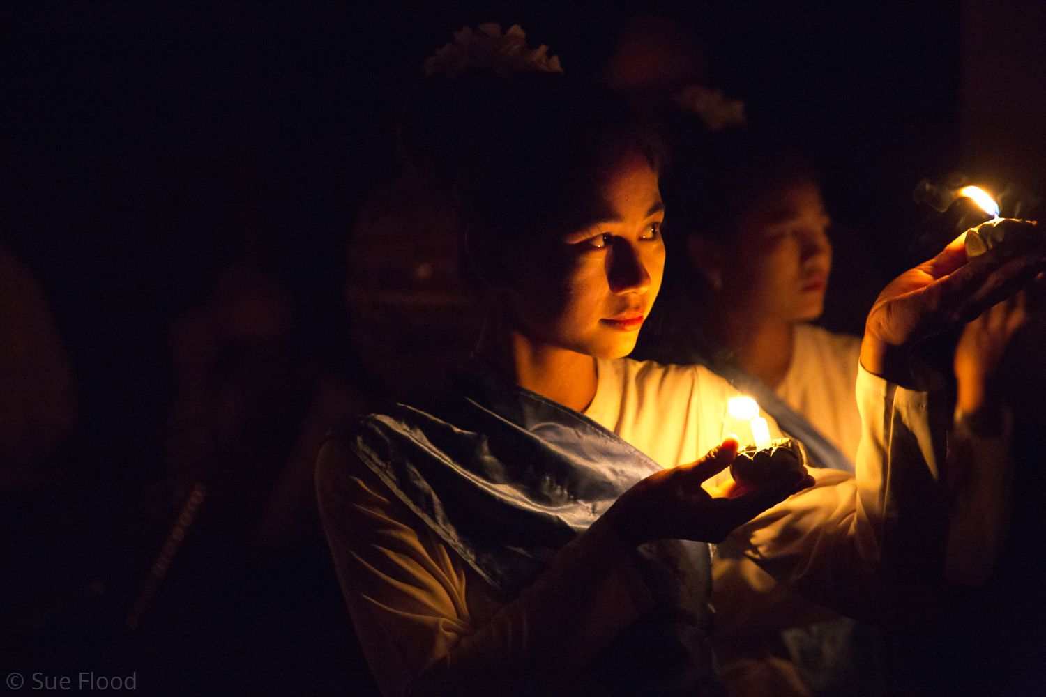 Dancers performing by candlelight, Myanmar