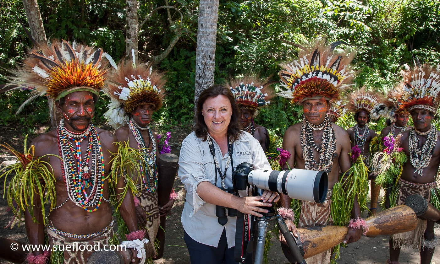 Sue Flood with tribesmen in Papua New Guinea